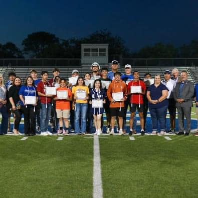 Somerset ISD Education Foundation Student Scholarship Recipients and Donors with Foundation Board Members at Somerset High School Senior Walk, May 2023